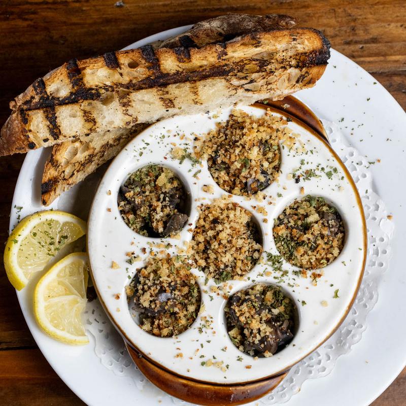 Escargot baked with herb breadcrumbs and grilled bread at Harper's