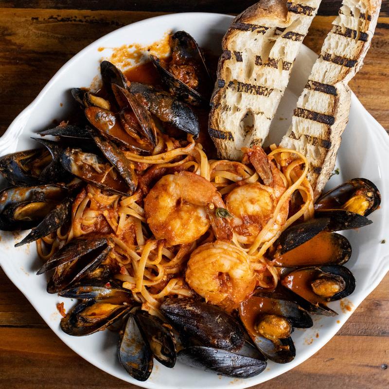 Seafood linguine with mussels, shrimp and grilled bread at Harper's