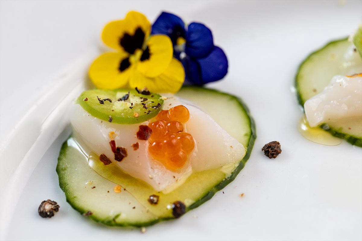 Scallop crudo with citrus and edible flowers at Harper's